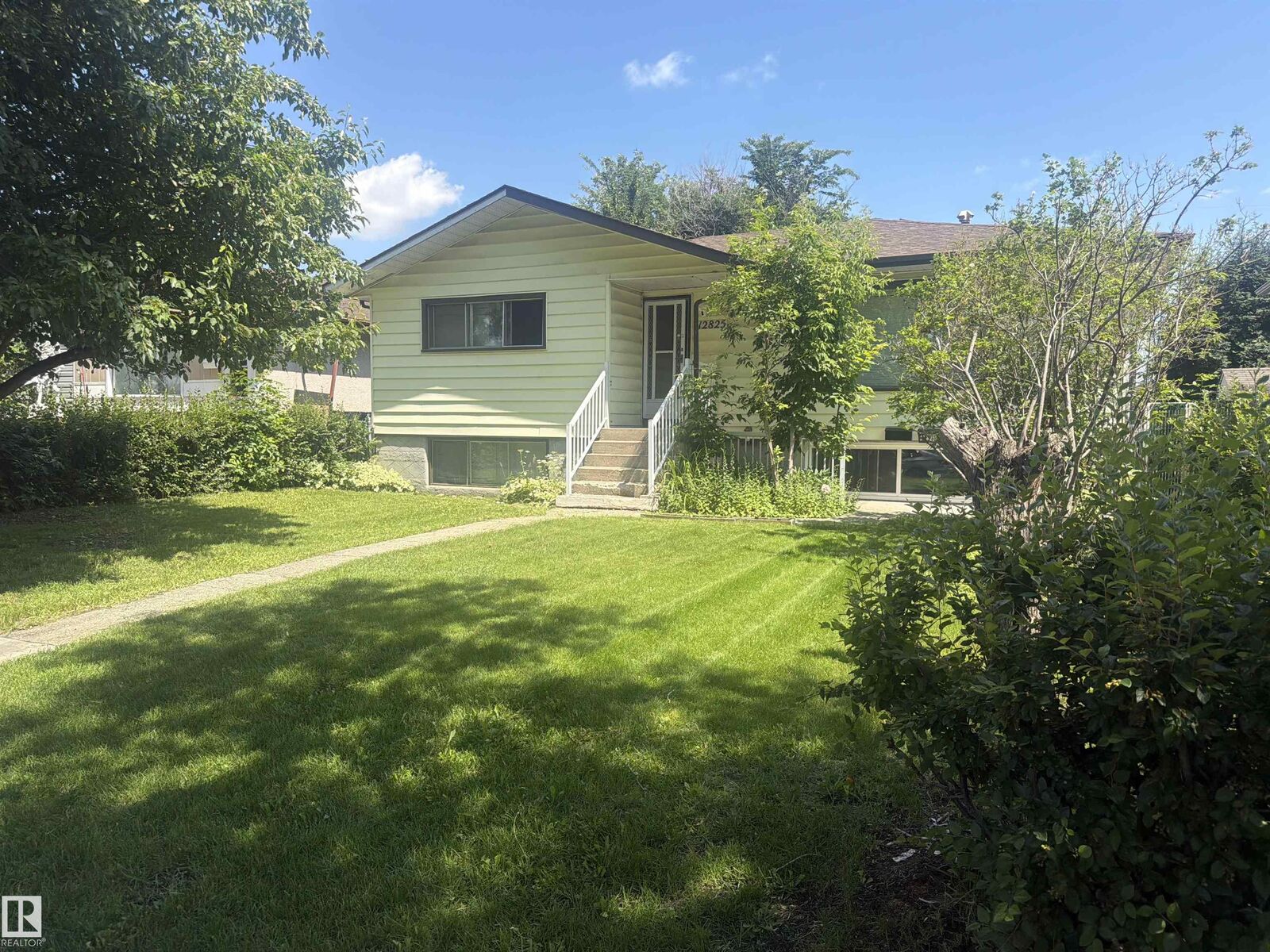 Property Photo:  12825 102 Street NW  AB T5E 4J2 