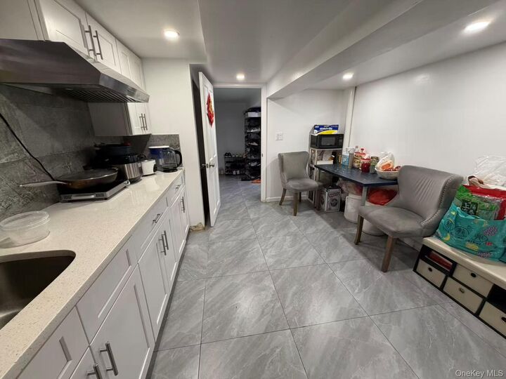 Property Photo:  1101 128th Street  NY 11356 
