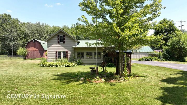 Property Photo:  12164 N Elms Road  MI 48420 