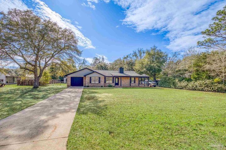 Property Photo: 5279 Willard Norris Rd FL 32570