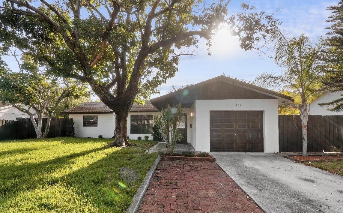 Property Photo:  1661 NW 1st Avenue  FL 33060 