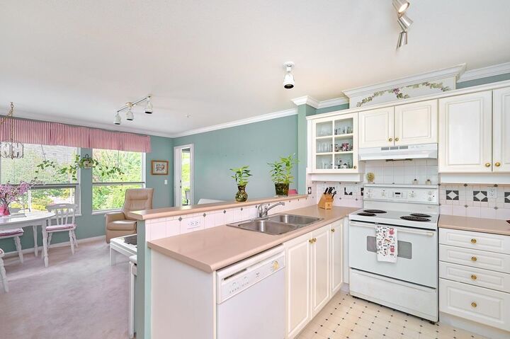 Property Photo:  12911 Railway Avenue 211  BC V7E 6L8 