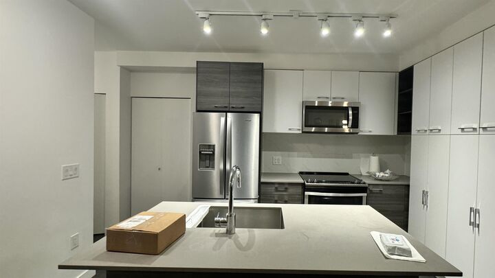 Property Photo:  13963 105 Boulevard 314  BC V3T 4N6 