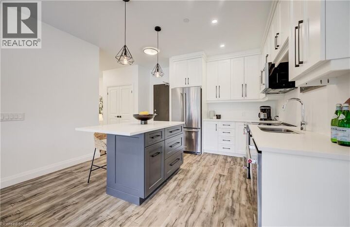 Property Photo: 332 Gosling Gardens 104 ON N1L 0P8