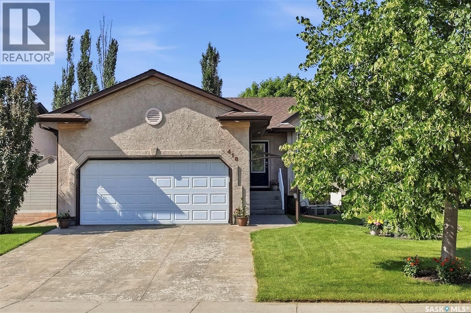 Property Photo: 418 Bayfield Crescent SK S7V 1E6