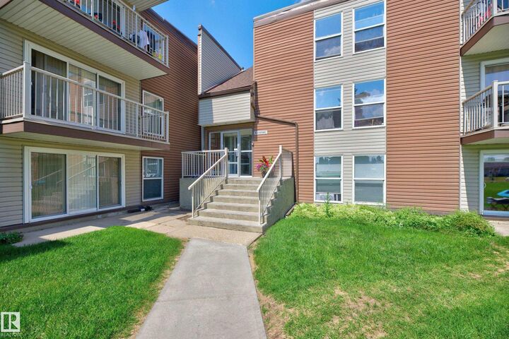 Property Photo: 7220 144 Avenue NW 209 AB T4C 3E4