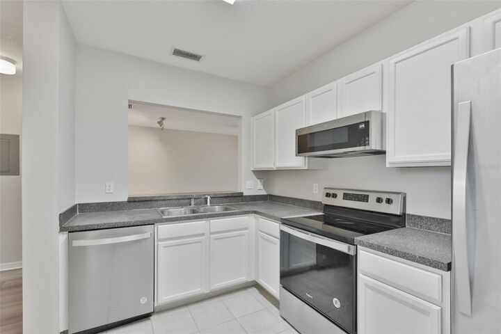 Property Photo: 6437 Cypressdale Drive 201 FL 33578