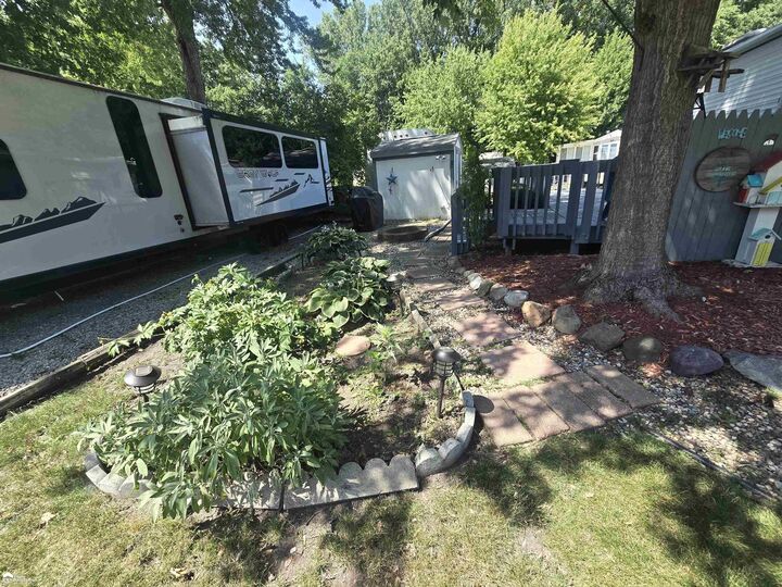 Property Photo:  10001 Goodall Road 62  MI 48429 