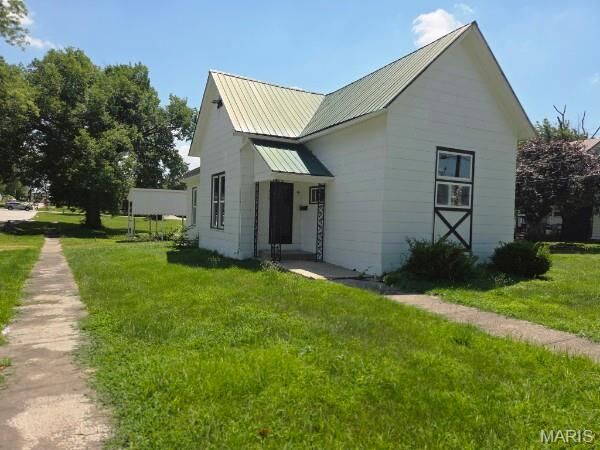 Property Photo: 113 E Cleveland Street MO 63456