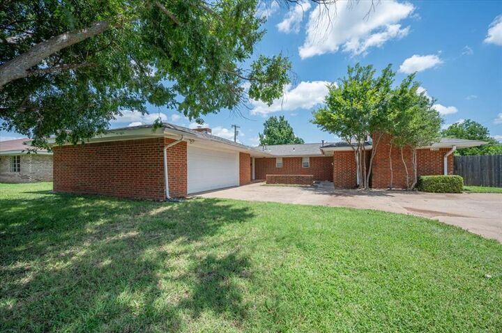 Property Photo: 1509 N Hartford Street 1509 &Amp 1511 OK 74075
