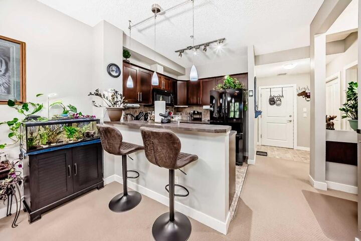 Property Photo: 201 Sunset Drive 113 AB T4C 0H5