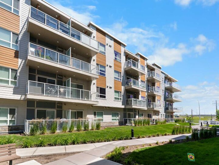 Property Photo: 200 Harvest Hills Place NE 305 AB T3K 2N3