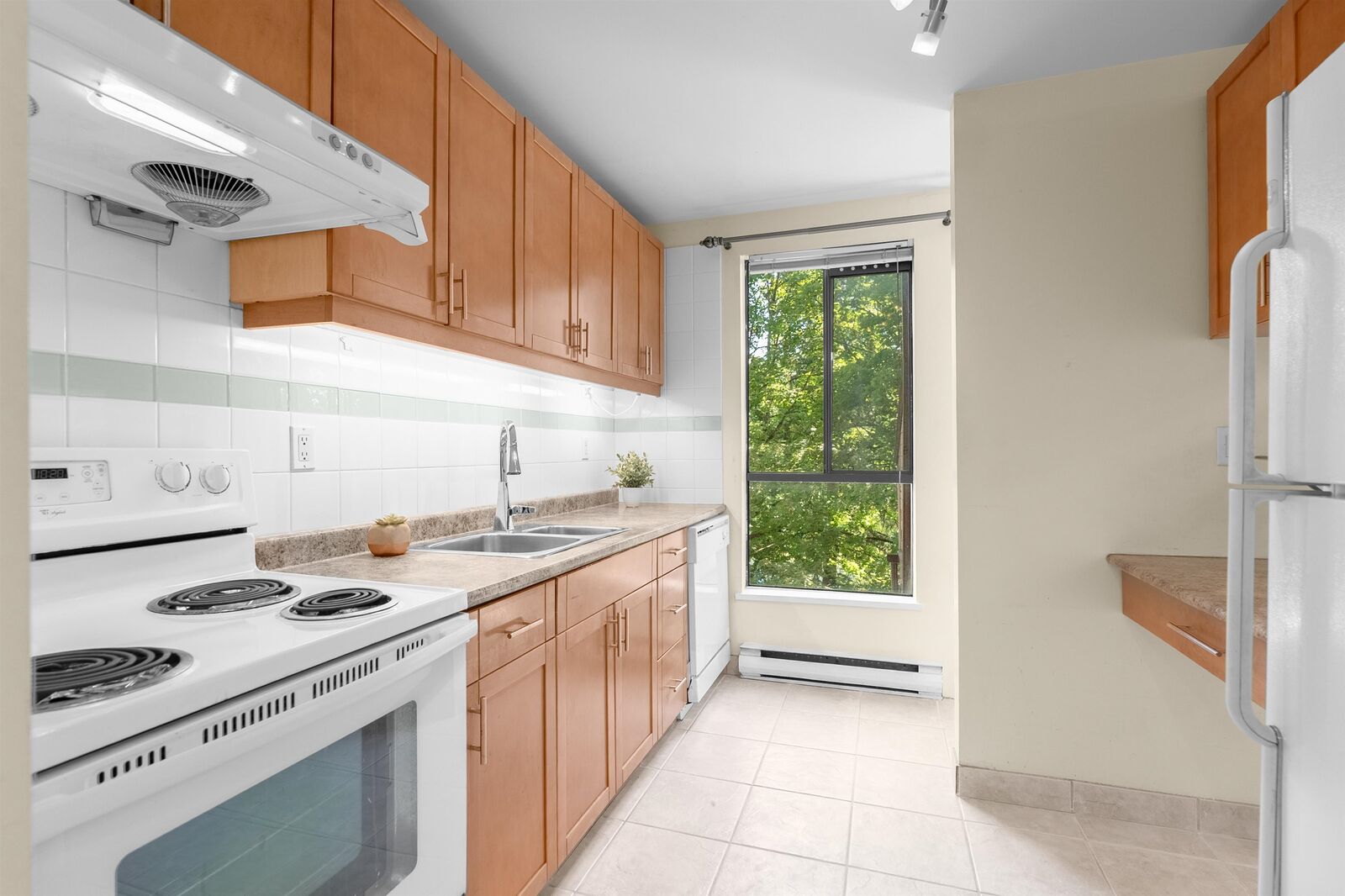 Property Photo: 9153 Saturna Drive 201 BC V3J 7K1