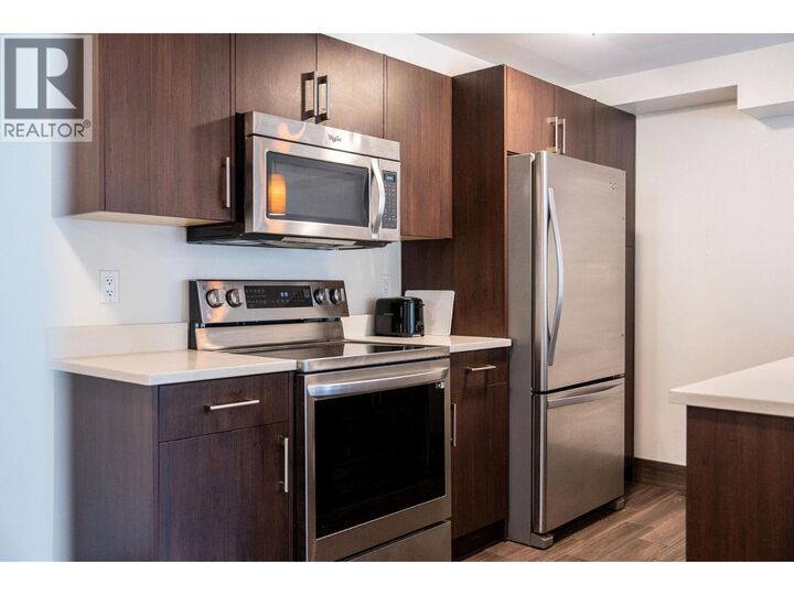 1211 Victoria Road West 203 — photo 1