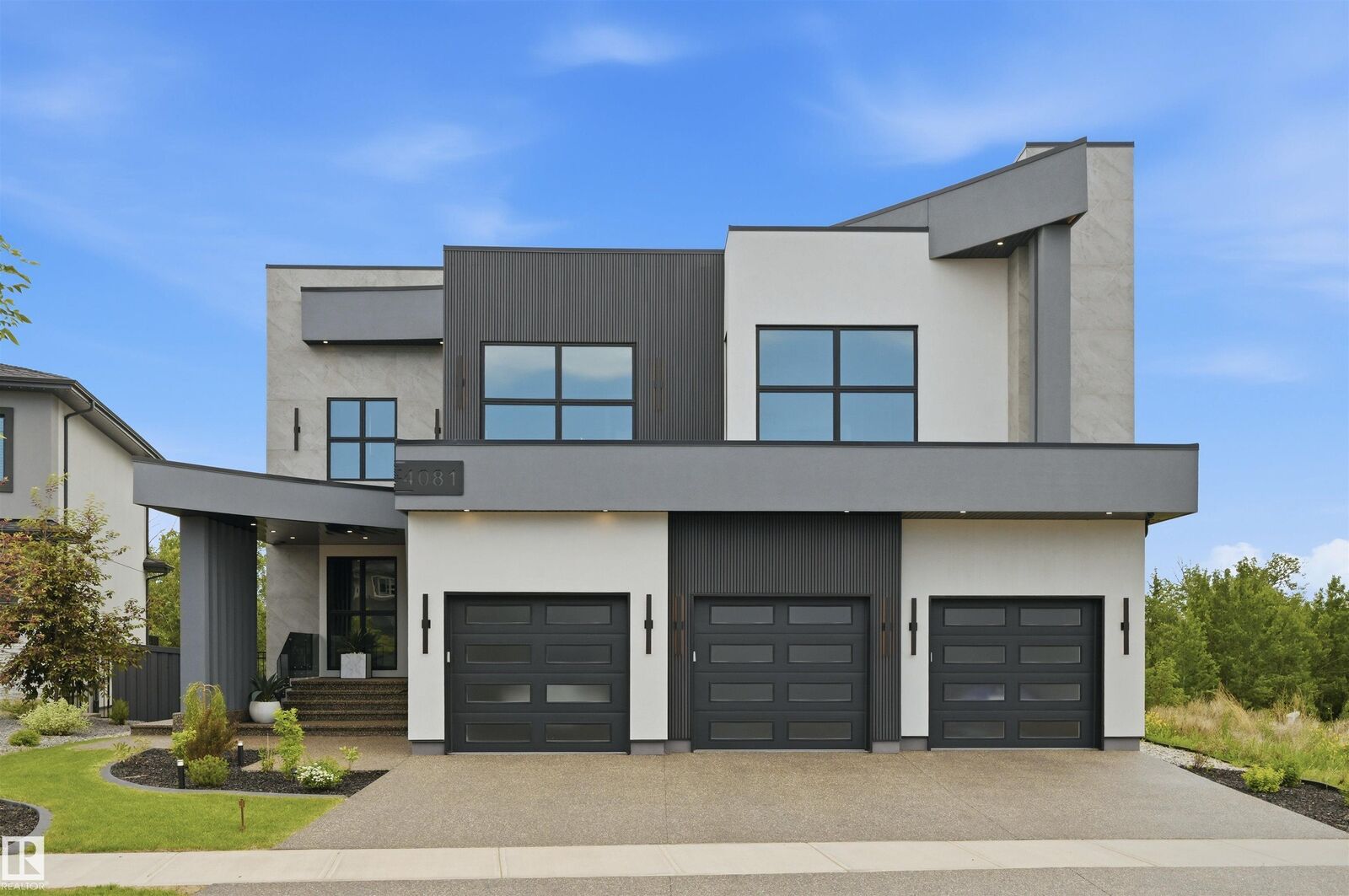 Property Photo: 4081 Whispering River Drive SW AB T6W 2E2