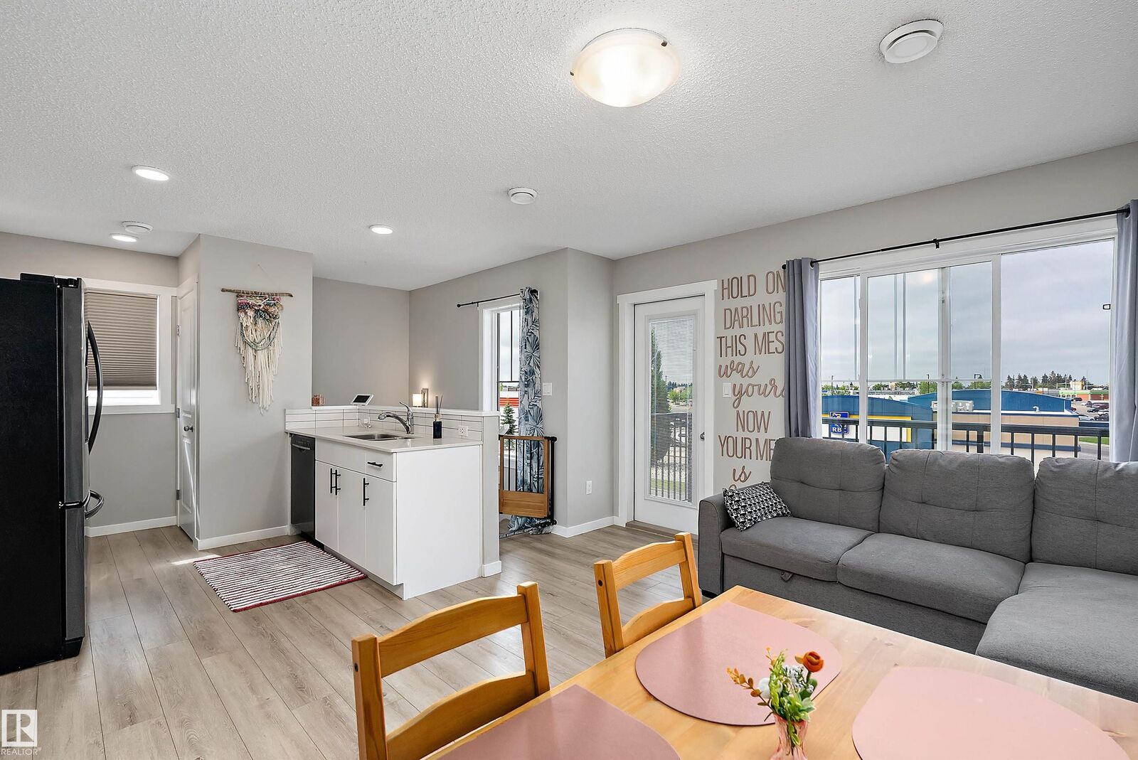 Property Photo: 50 McLaughlin Drive 65 AB T7X 0E1