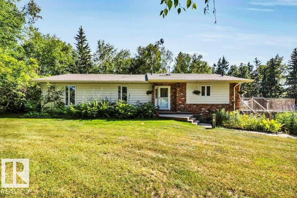 Property Photo: 27-51128 Rge Rd 261 AB T7Y 1B8