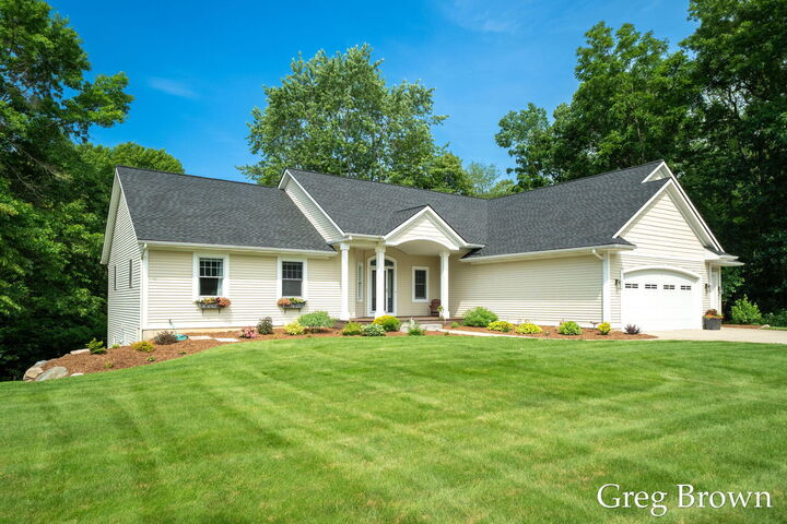 Property Photo: 1995 Knollpoint Drive NE MI 49301