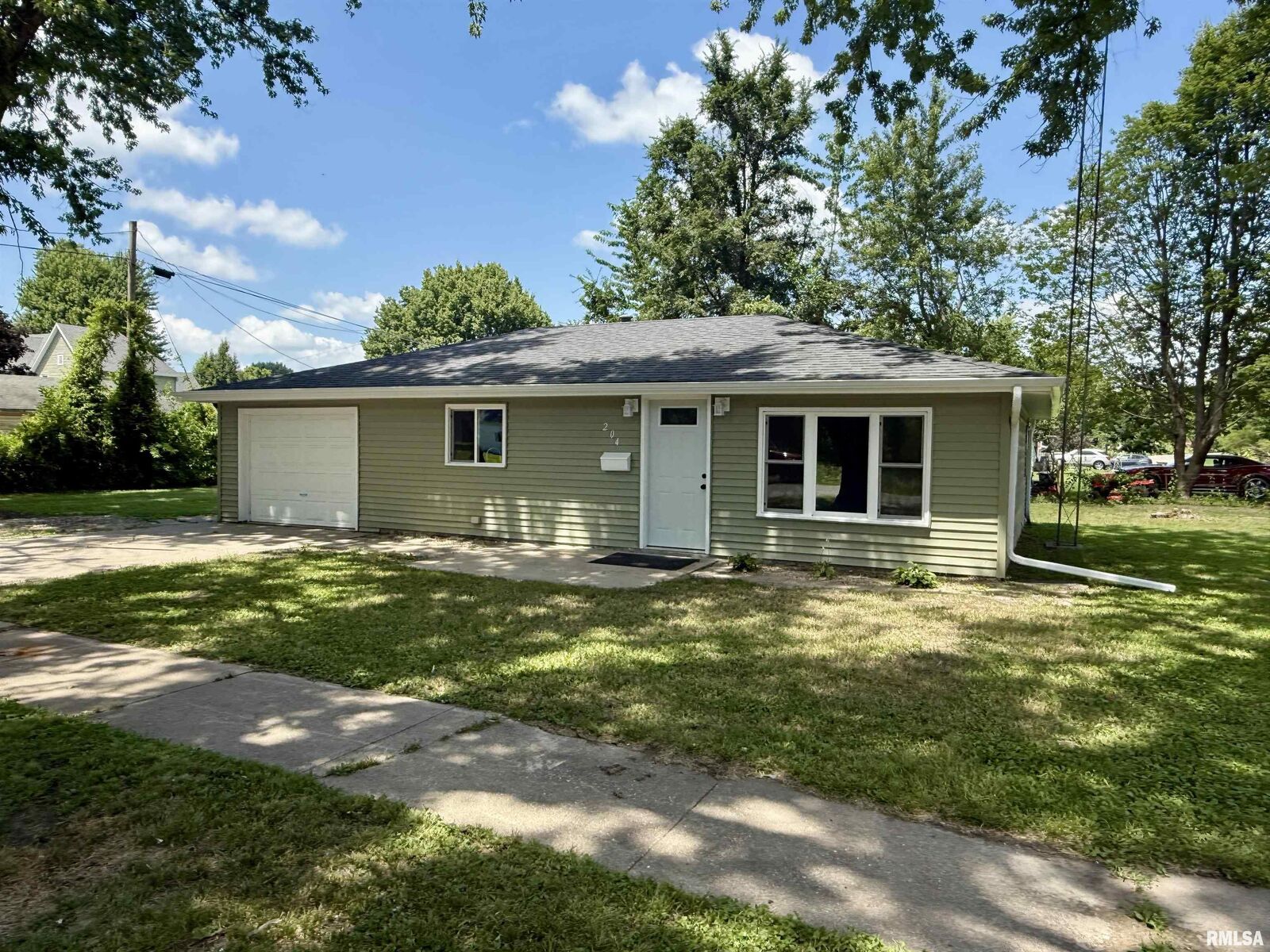 Property Photo:  204 E Adams Street  IL 61410 