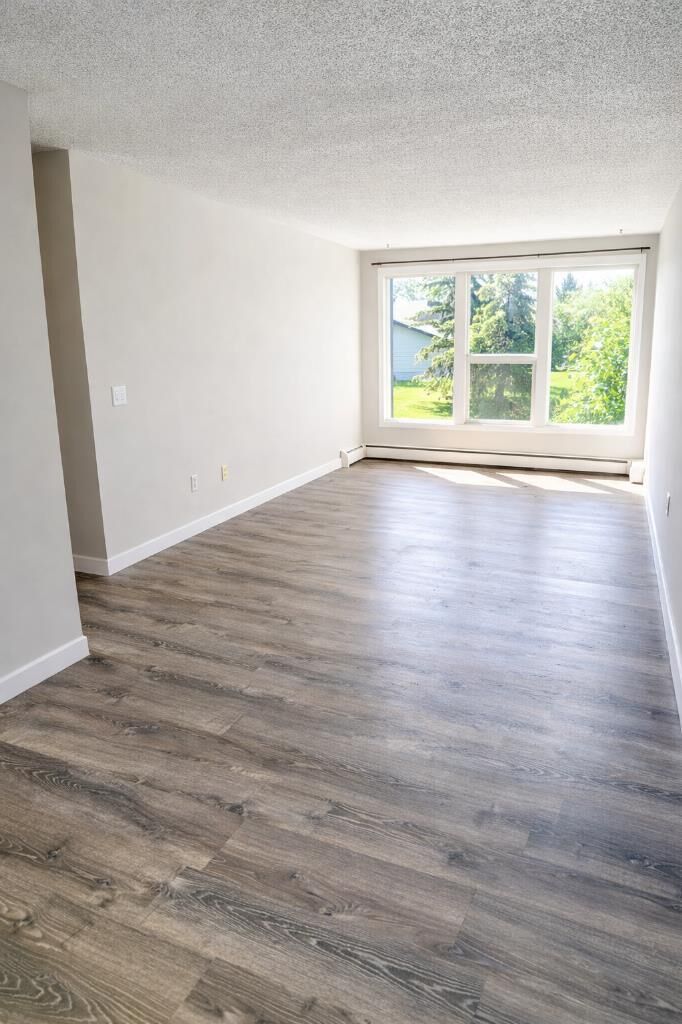 Property Photo:  101 Big Hill Way SE 206  AB T4A 1Z6 
