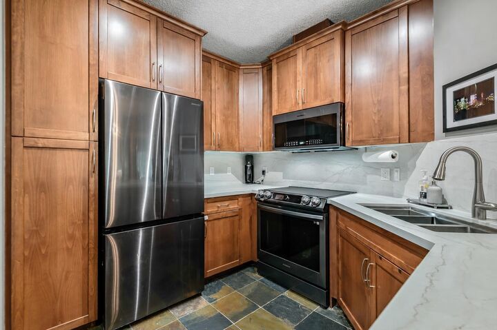 Property Photo: 20 Discovery Ridge Close SW 233 AB T3H 5X4