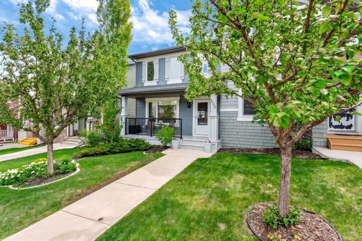 Property Photo: 102 Panatella Hill NW AB T3K 0B6