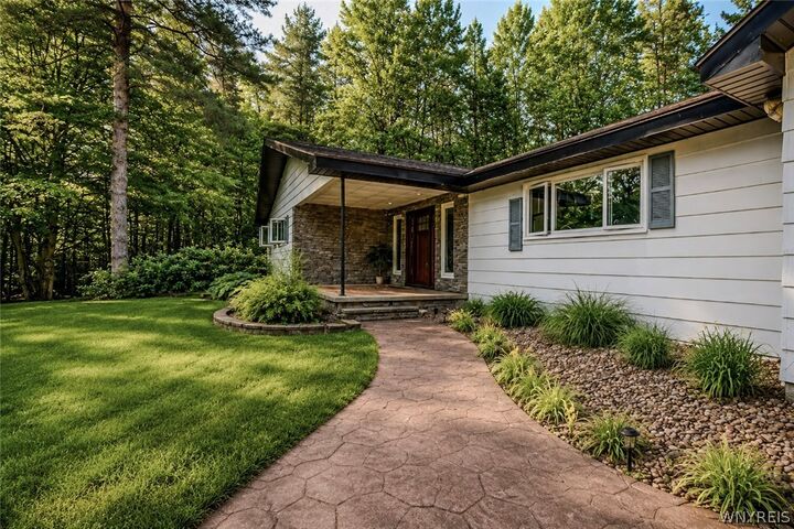 Property Photo:  4137 Chapel Hill Road  NY 14706 