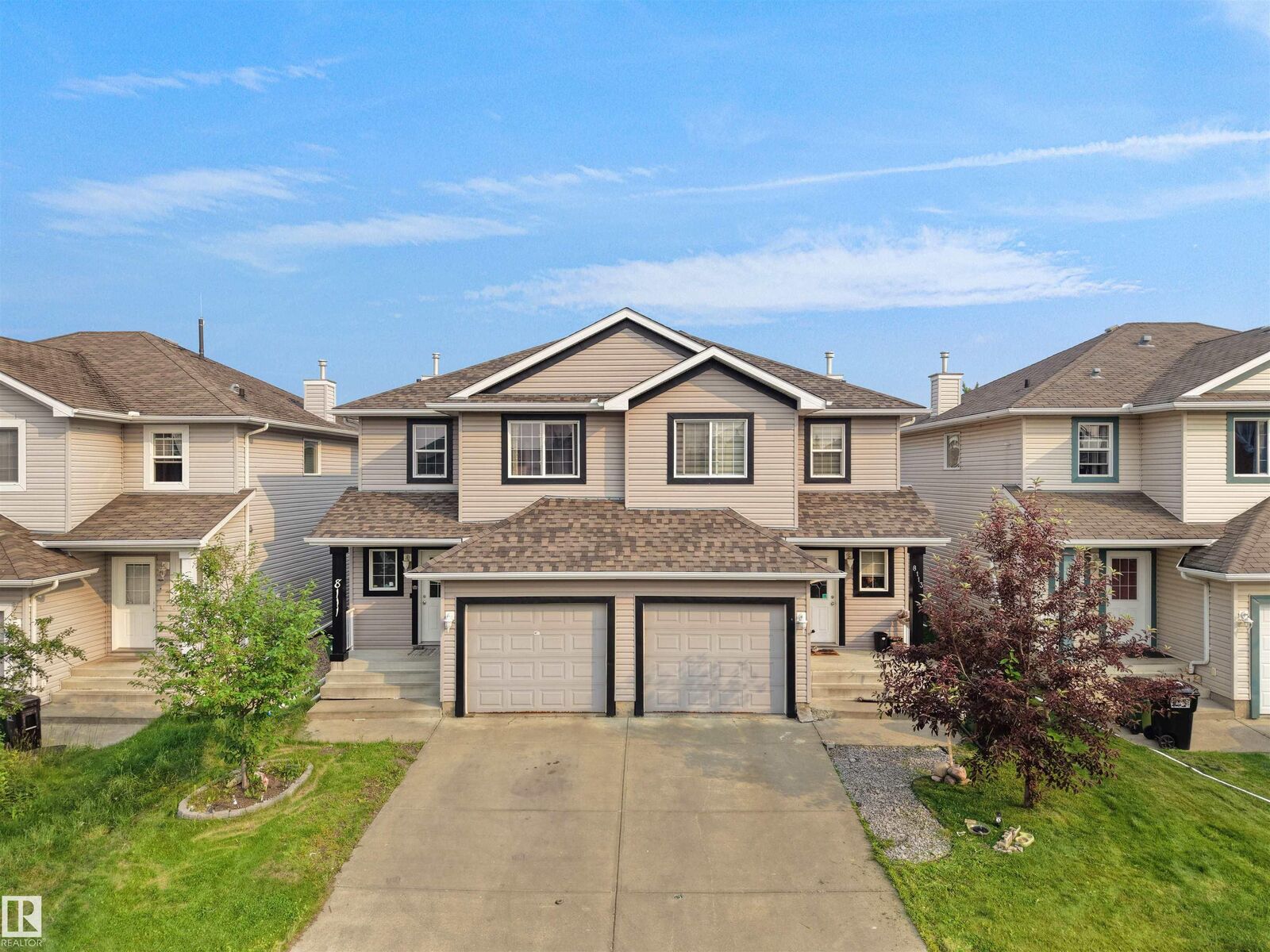 Property Photo:  8111 7 Avenue SW  AB T6X 1L9 