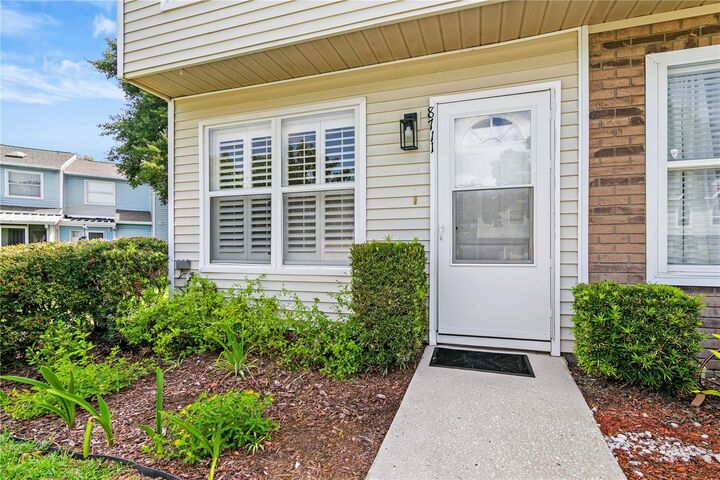 Property Photo: 8711 Cobbler Place FL 33615