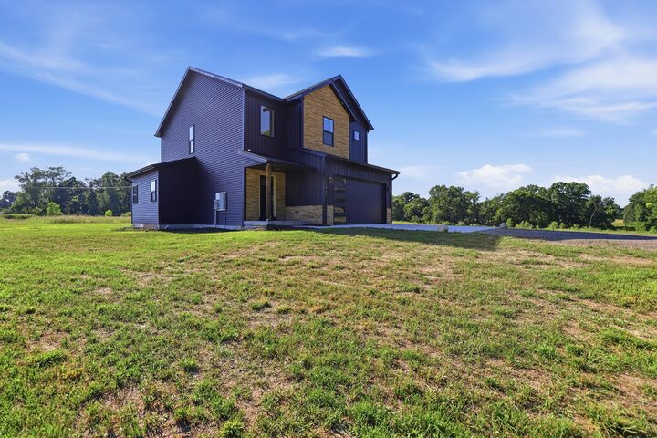 Property Photo: 11427 Heintzelman Road NE MI 49341