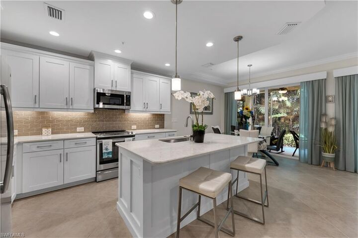 Property Photo: 6959 Avalon Cir 1702 FL 34112