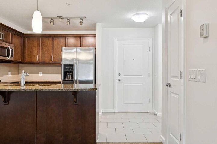 Property Photo:  310 McKenzie Towne Gate SE 3102  AB T2Z 1J4 