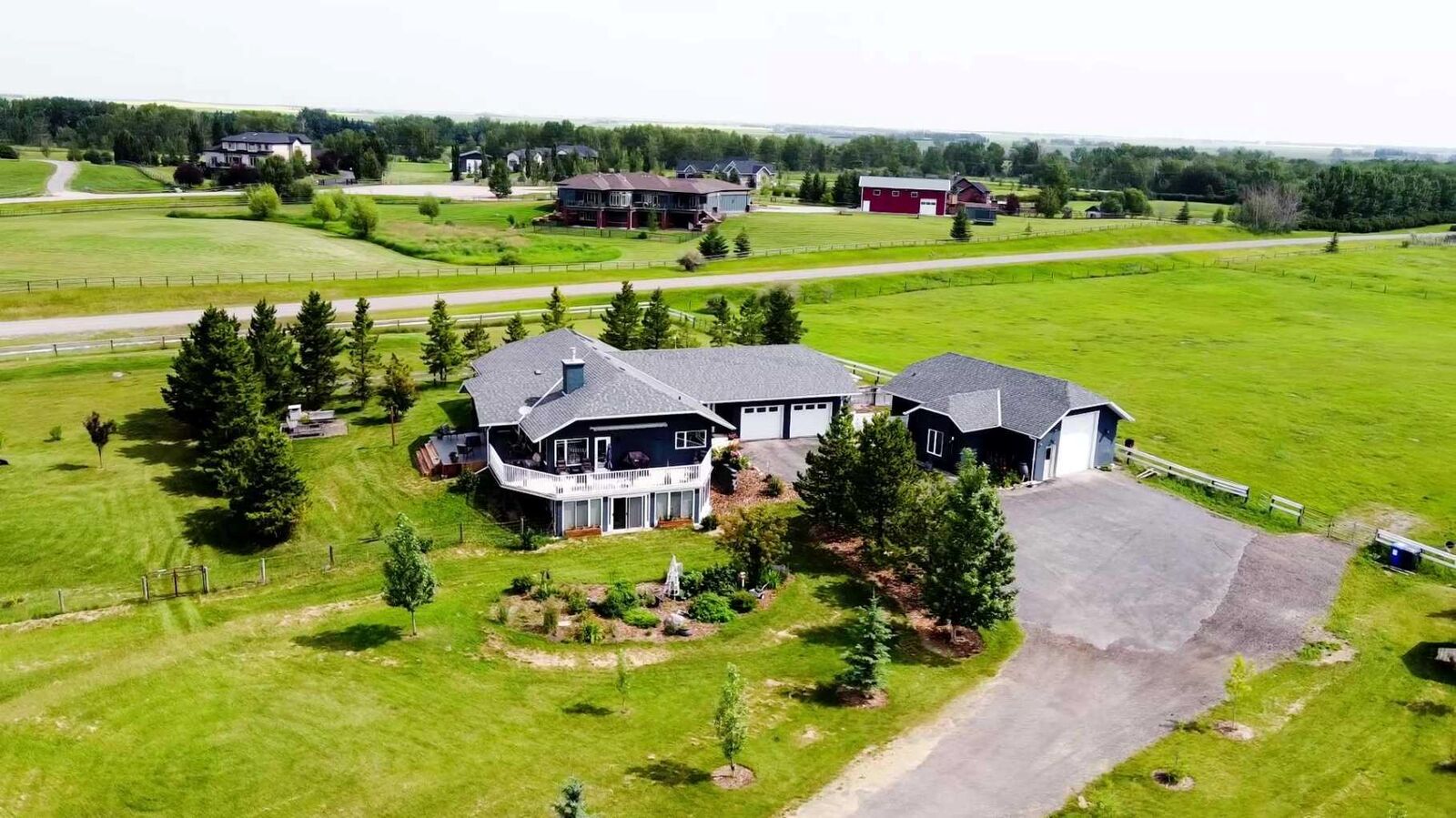 Property Photo: 226016 76 Street E AB T1S 3W2
