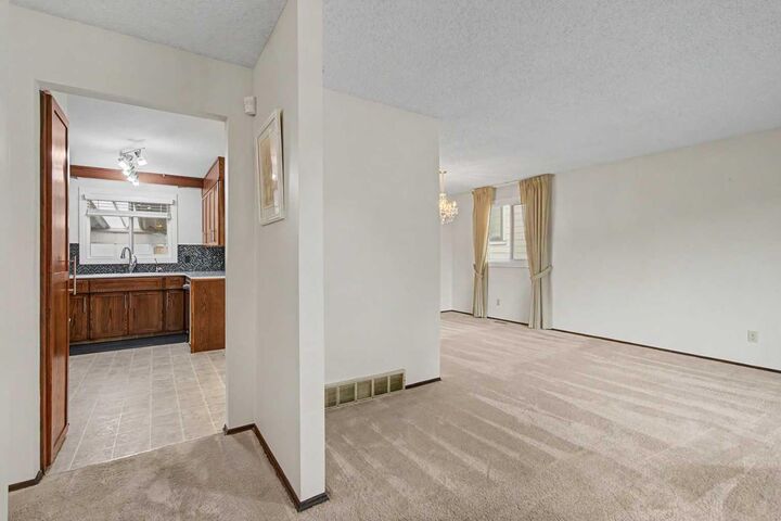Property Photo: 163 Lake Sylvan Close SE AB T3J 3E5