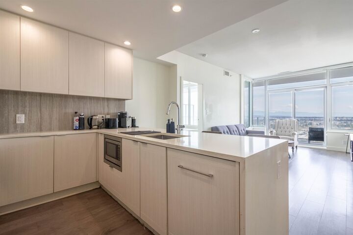 Property Photo: 5051 Imperial Street 1803 BC V5J 0J3