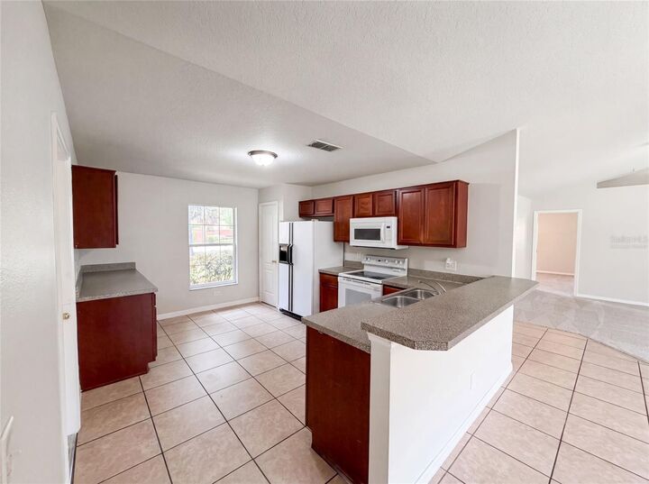 Property Photo:  306 Garden Oak Court  FL 32703 