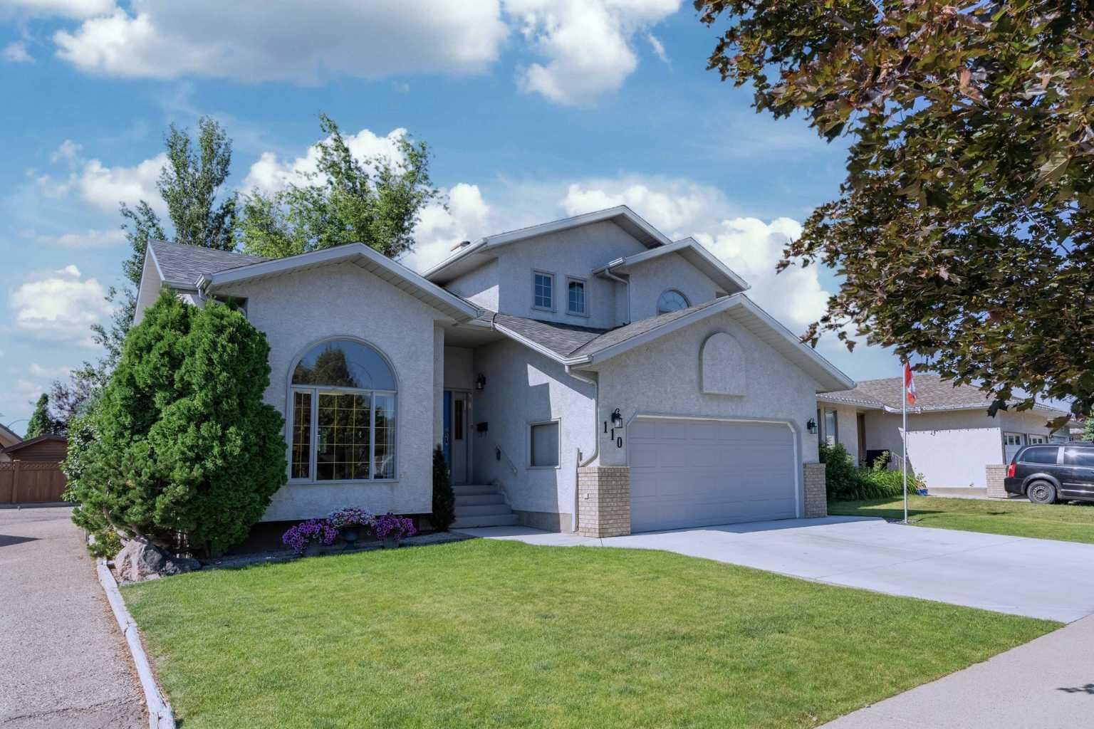 Property Photo: 110 Heritage Boulevard W AB T1K 6R9
