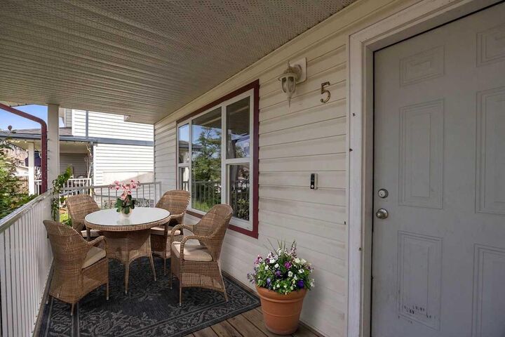 Property Photo: 100 St. Laurent Way 5 AB T9K 2R4