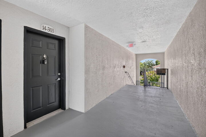 Property Photo:  15135 Michelangelo Boulevard 303  FL 33446 