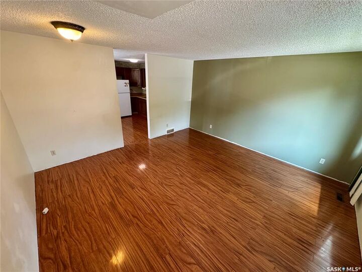 Property Photo: 7303 Blakeney Drive SK S4X 2N6