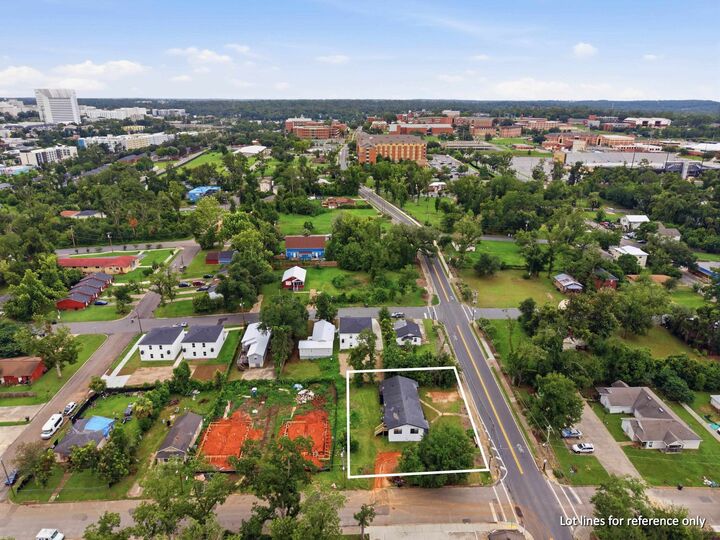 Property Photo: 826 Robert And Trudie Perkins Way 1&2 FL 32310