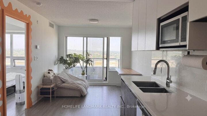 Property Photo: 15 Water Walk Drive 1201 ON L6G 0G2