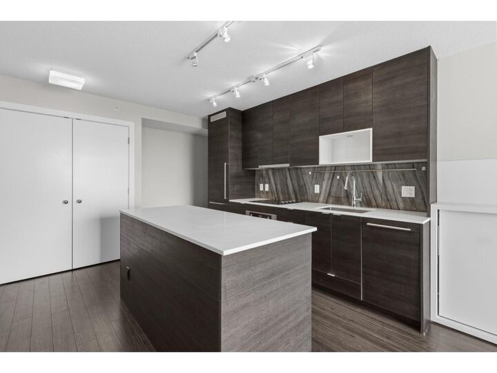Property Photo:  13398 104 Avenue 1912  BC V3T 1V6 