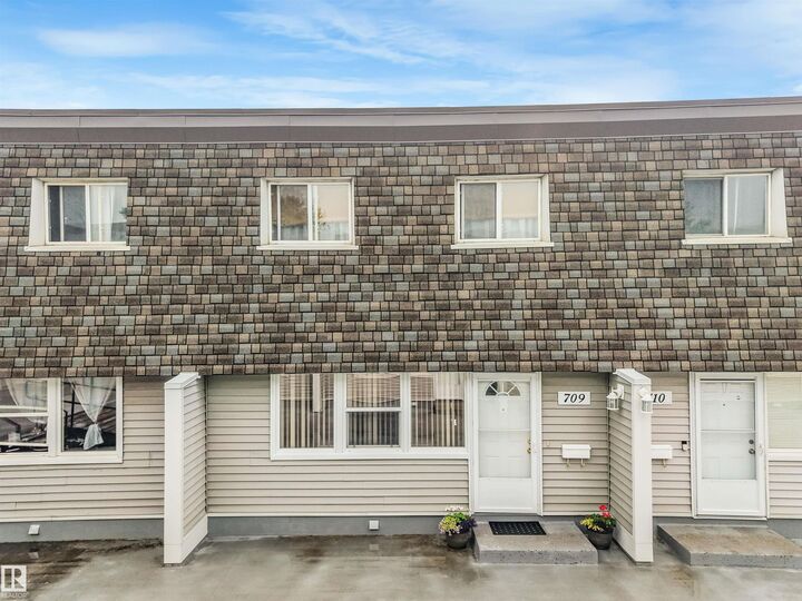 709 Village On The Green Green NW — photo 1