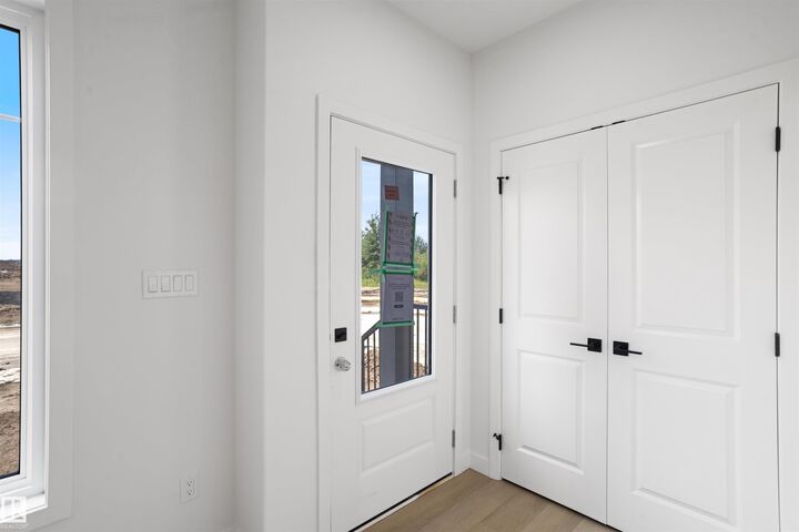 Property Photo: 1563 211 Street NW AB T6M 3P1