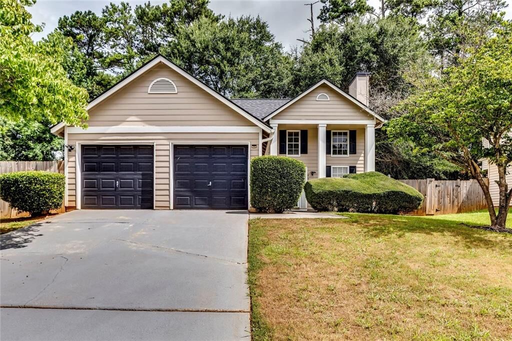 Property Photo: 4936 Windsor Downs Drive GA 30035