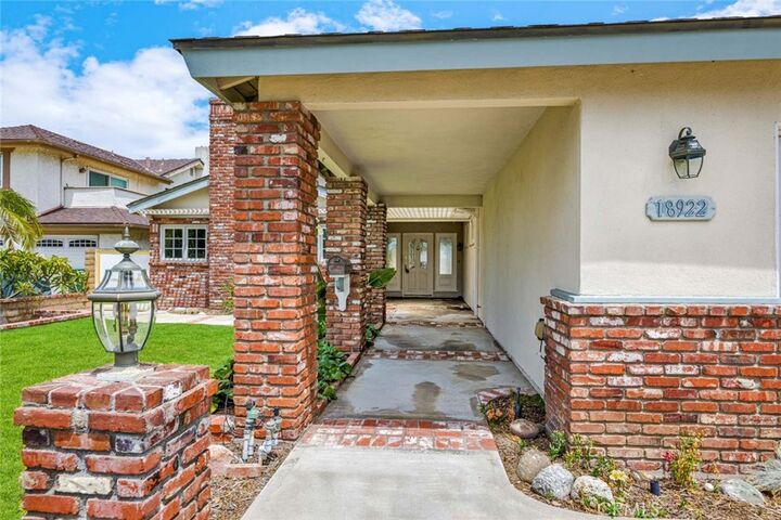 Property Photo:  18922 Gregory Lane  CA 92646 