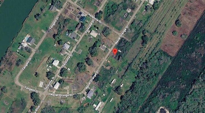 Property Photo:  177 Naval Orange Drive  LA 70041 