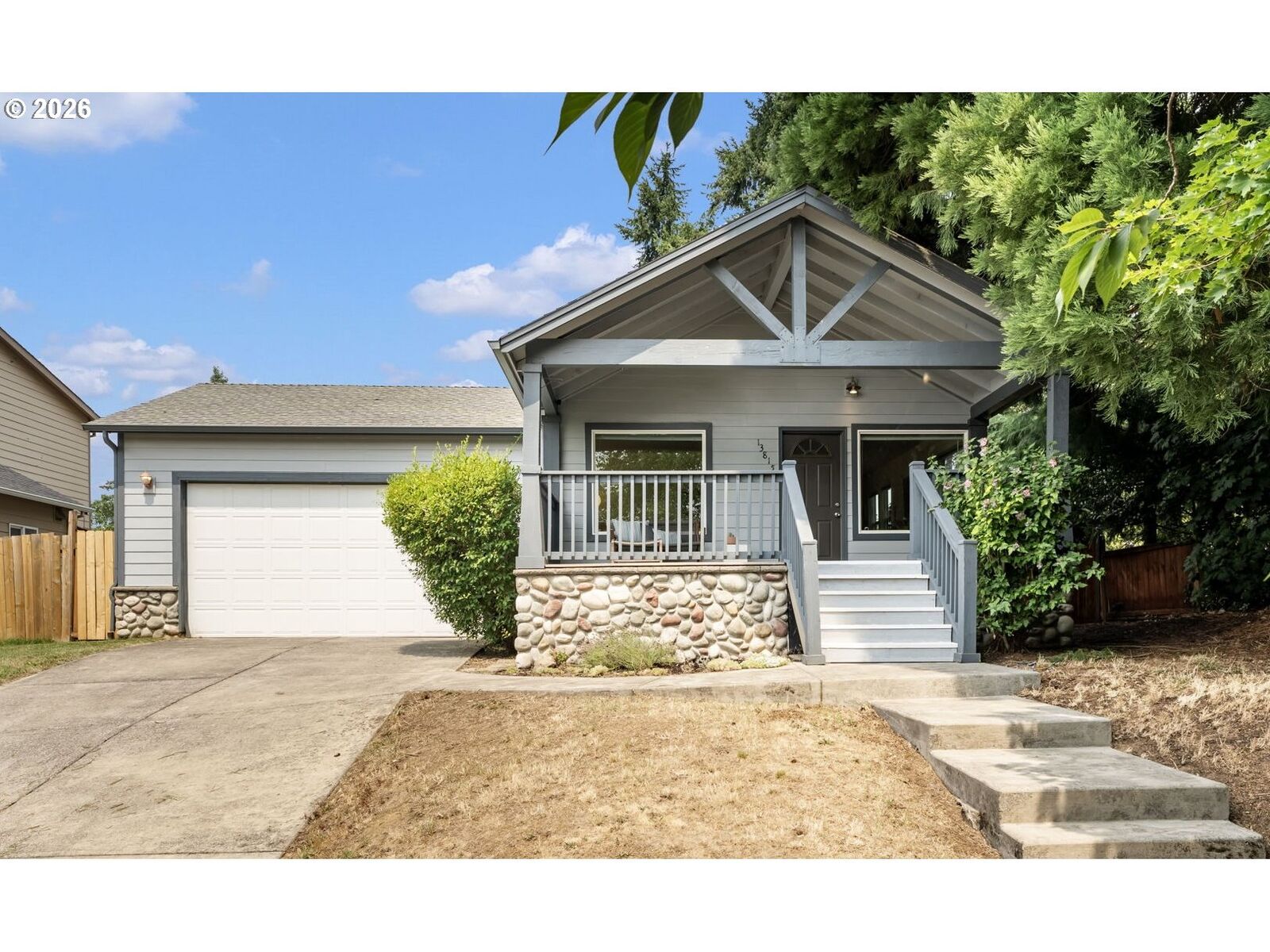 Property Photo:  13815 SE Steele St  OR 97236 