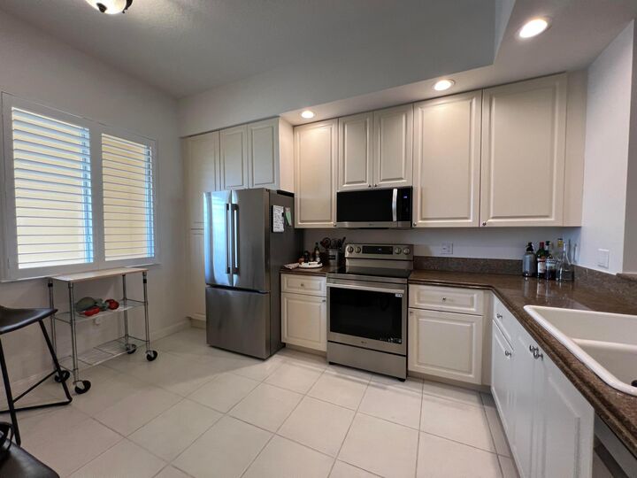 Property Photo: 13 Harbour Isles Drive W Ph02 FL 34949